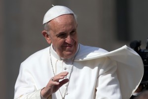 Pope Francis waves from his popemobile as he arrives for his weekly general audience in St. Peter Square at the Vatican, Wednesday April 24, 2013.(AP Photo/Alessandra Tarantino)